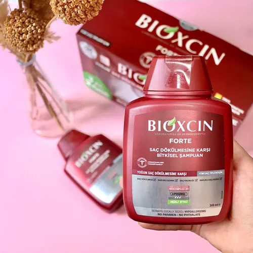 شامپو ضد ریزش بیوکسین برای انواع مو Bioxcin
